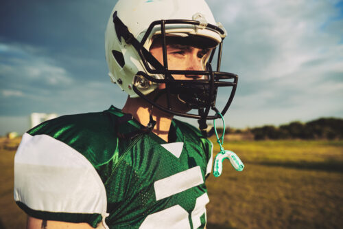 football player with mouthguard